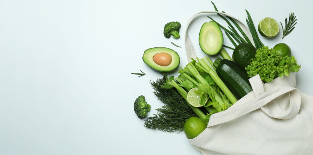 cotton bag with green vegetables on white backgrou 2021 05 04 21 09 17 utc