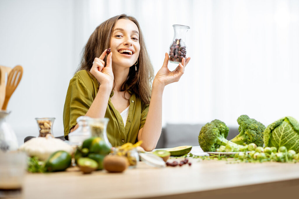 young woman with fresh vegan food ingredients 2021 04 13 19 40 56 utc